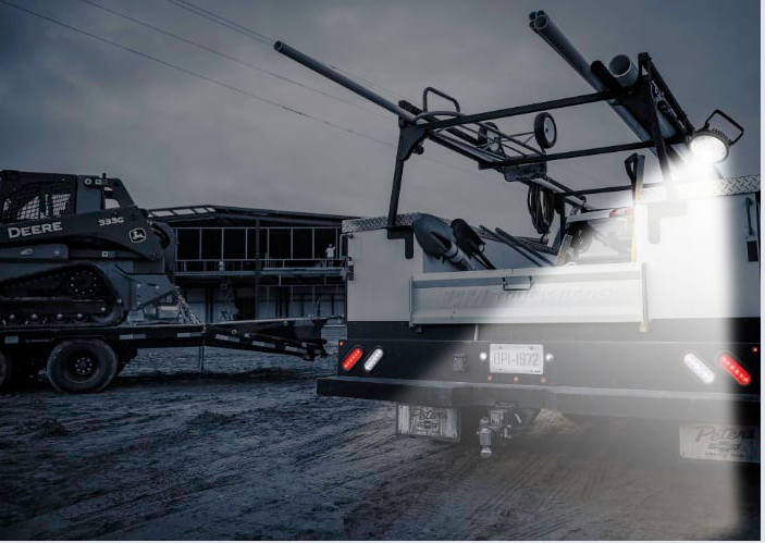 Work truck fitted with bright exterior work lights